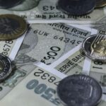 Image Represent Indian 500 rupee note and 10 rupee coin